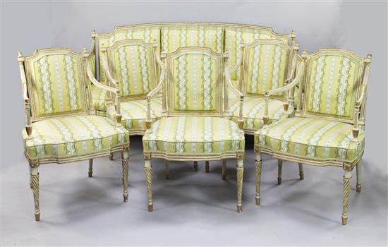 A suite of George III white and gilt seat furniture, comprising five armchairs and a settee, W.6ft 6in.